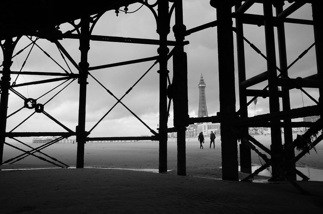 A view of the Blackpool Tower from the promenade in Black and White
